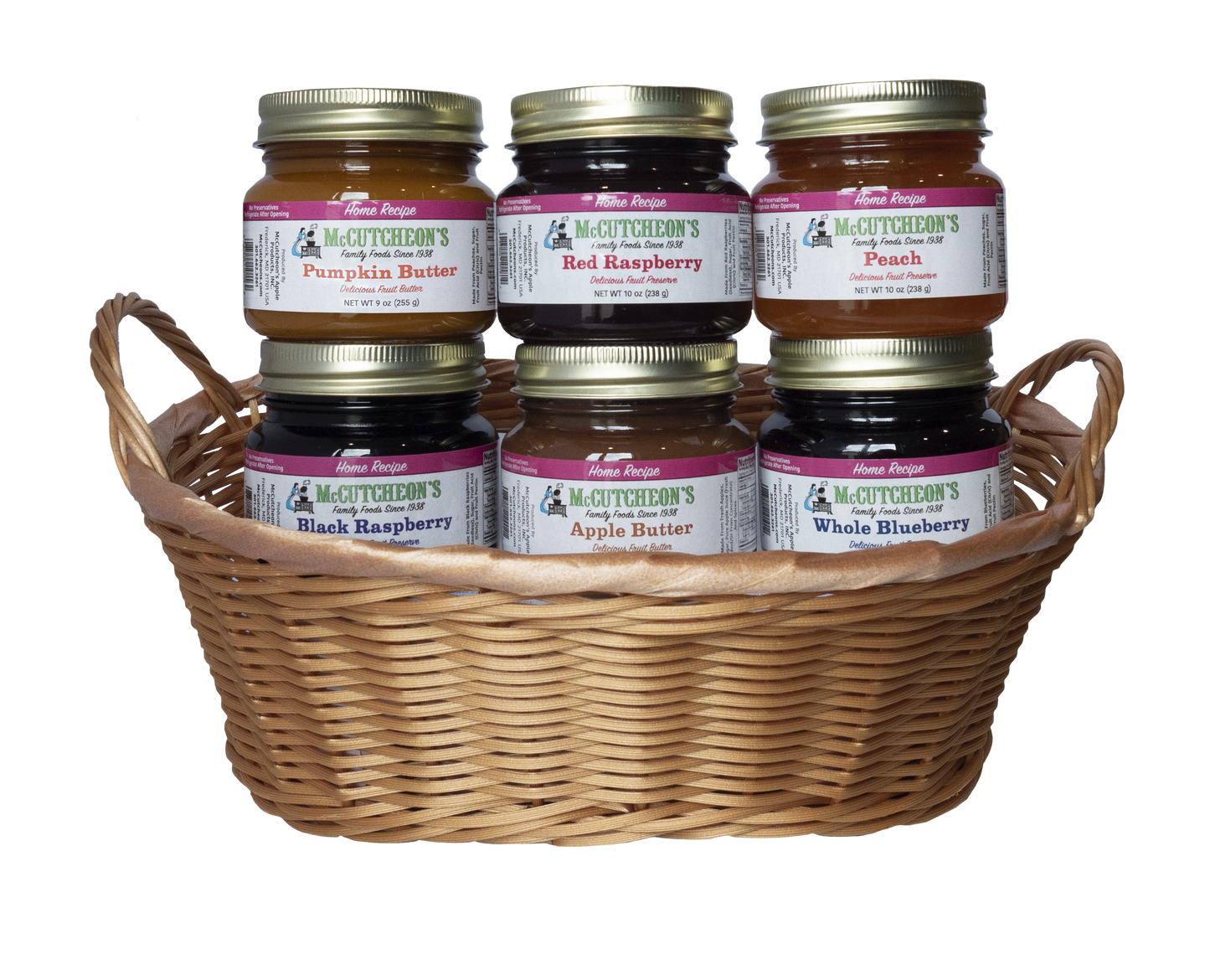 6 mini jars of Apple Butter, Pumpkin Butter, Red raspberry Preserves, Peach Preserves, Black Raspberry Preserves, and Whole Blueberry Preserves in a basket