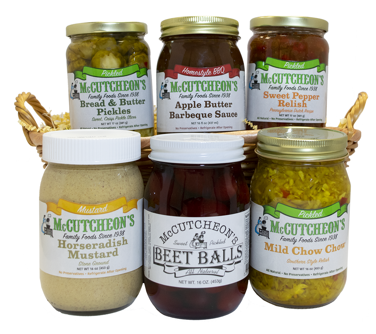 6 jars in a basket including Bread & Butter Pickles, Apple Butter Barbeque Sauce, Sweet Pepper Relish, Horseradish Mustard, Beet Balls, and Mild Chow Chow