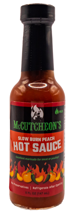 bottle of McCutcheon's slow burn peach hot sauce
